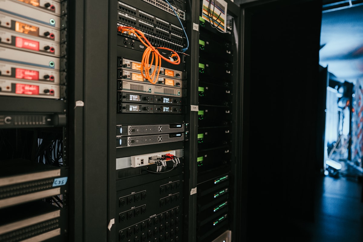 Server rack room with equipment blinking indicators